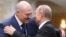 Belarusian leader Alyaksandr Lukashenka greets Russian President Vladimir Putin in Minsk in November 2017