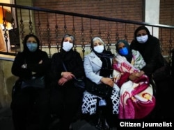 Akram Neghabi (left) with other grieving mothers whose children were either killed or are in prison after participating in anti-government protests