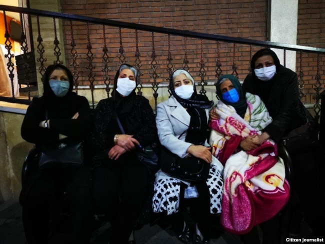 Akram Neghabi (left) with other grieving mothers whose children were either killed or are in prison after participating in anti-government protests