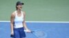 TENNIS/ Tsvetana Pironkova of Bulgaria reacts after winning a point against Alize Cornet of France