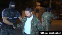 Armenia - Artur Sargsian surrenders to security forces at the end of their standoff with opposition gunmen in Yerevan, 31Jul2016.