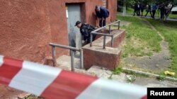 Слідчі на місці одного з вибухів, Львів, 14 липня 2015 року