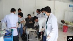 Афғонистондаги ҳужумлардан бирида яраланган киши.
