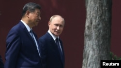 Орусиянын президенти Владимир Путин Кытайдын лидери Си Цзиньпин менен Бейжинде жолукту. 