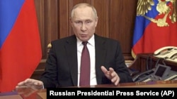 Президент Росії Володимир Путін виступає зі зверненням у зв'язку з повномасштабним вторгненням російських військ в Україну. Москва, 24 лютого 2022 року