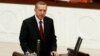 Turkey -- Turkish new President Tayyip Erdogan attends a swearing in ceremony at the parliament in Ankara, August 28, 2014