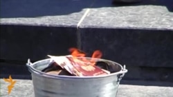 Russian Couple Burns Passports In Lviv