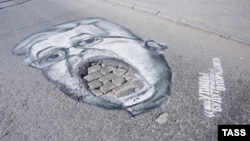 A pothole caricature of Yekaterinburg City Manager Aleksandr Yakob