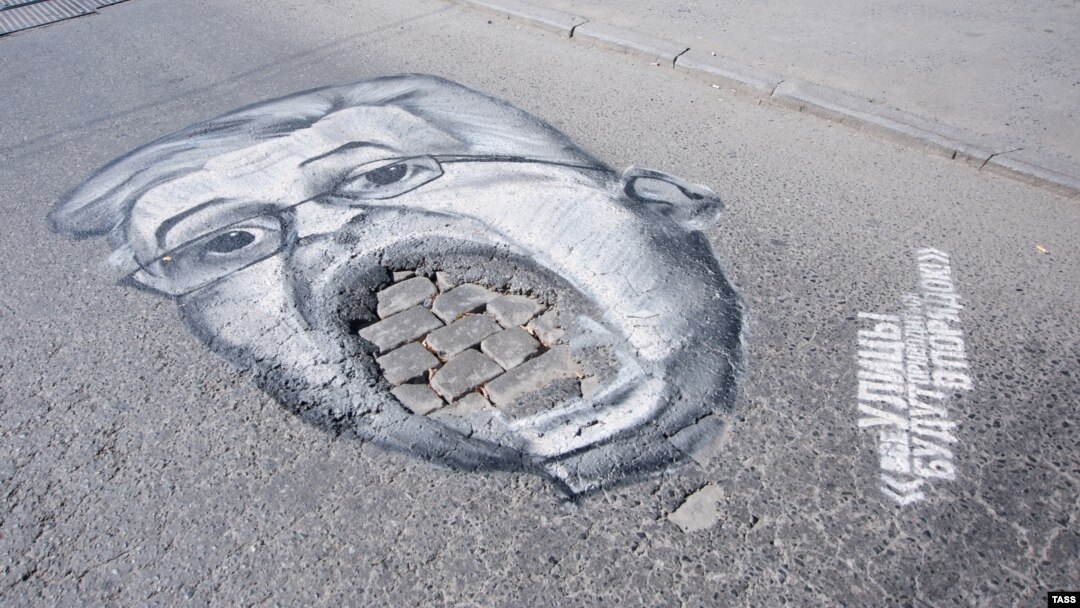 A pothole caricature of Yekaterinburg City Manager Aleksandr Yakob
