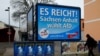 Plakat AfD-a na kojem piše: "Bilo je dosta, Saksonija glasa za AfD". Magdeburg, Njemačka, 13. mart 2016. 