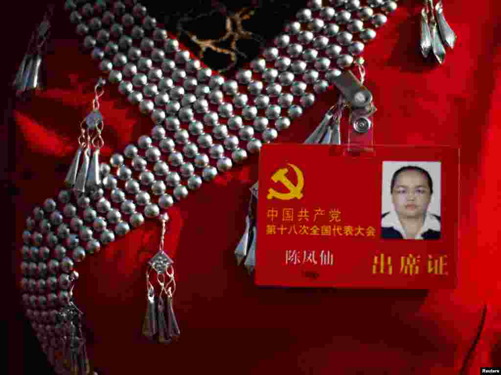 Delegat kongresa nakon ceremonije svečanog otvaranja, 8. novembar 2012. Foto: REUTERS / Carlos Barria 