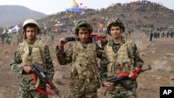 Eronning “Basij” harbiylashtirilgan guruhi jangchilari.