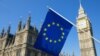 Generic – European Union flag hanging in front of Big Ben and the Houses of Parliament at Westminster Palace, London, in preparation for the Brexit EU referendum