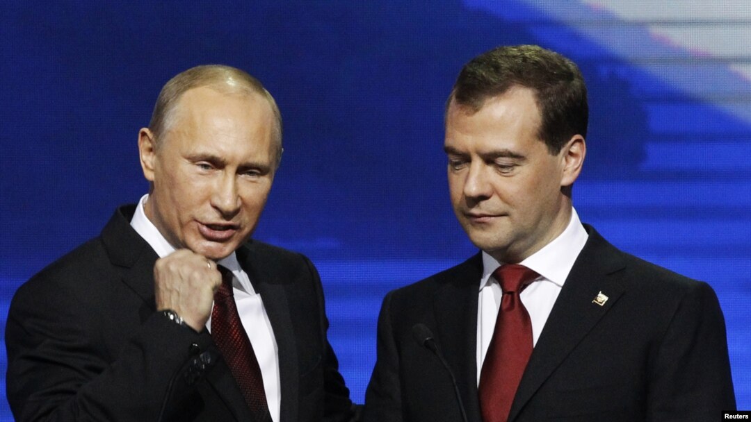 President Dmitry Medvedev (right) and Prime Minister Vladimir Putin addressing a United Russia party congress in Moscow in the run-up to parliamentary election. 
