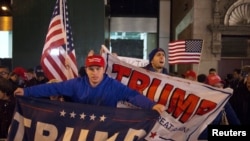 Сторонники Дональда Трампа в центре Нью-Йорка в день президентских выборов. 8 ноября 2016 года.