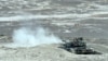 Azerbaijan - A Russian-manufactured tank opens fire during an Azerbaijani military exercise, 26Jun2014.