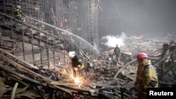 Activități de salvare și stingere a incendiului la sala de concerte Crocus din Moscova. 24 martie.