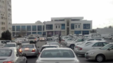 Turkmenistan. Full parking at the wholesale center. Inside, as eyewitnesses said, "the apple has nowhere to fall", the whole city is here. March 2021 