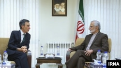 British Minister of State for the Middle East Andrew Murrison meeting with Iran's Kamal Kharrazi, June 23, 2019