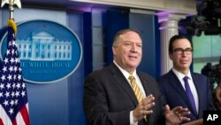 Secretary of State Mike Pompeo and Treasury Secretary Steve Mnuchin answer questions during a briefing on terrorism financing at the White House Sept. 10, 2019, in Washington. 