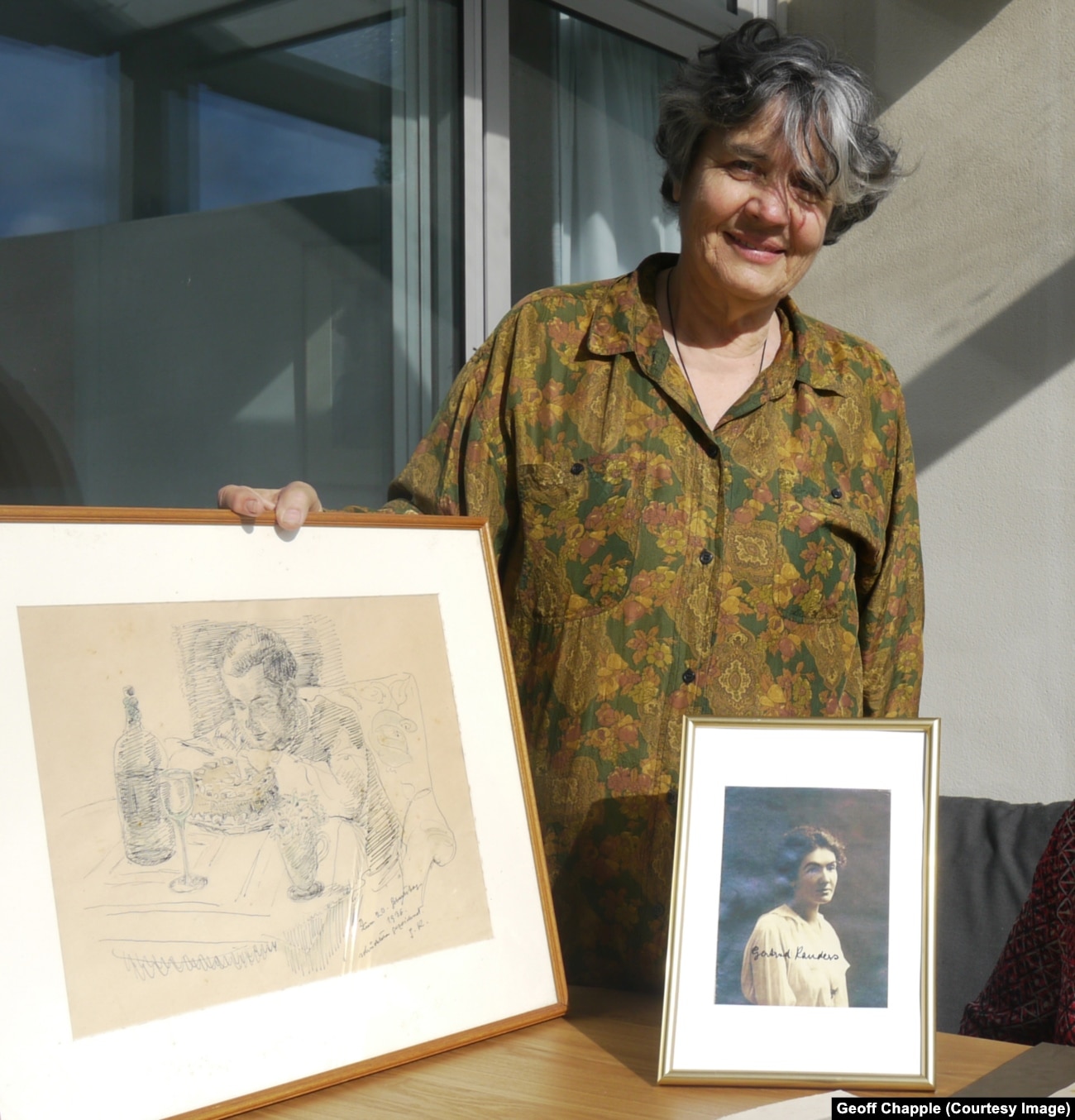 Miriam Kauders with a pencil sketch of her father, Cornelius, as drawn by Gertrud Kauders.