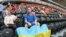 People take part in a peace rally held at the Donbas-Arena in the eastern Ukrainian city of Donetsk on May 20.