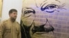 Кадыров Ахматан портретана хьалха лаьтташ ву цуьнан кIант Кадыров Рамзан (архивера сурт)