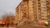 In all, 32 apartments were destroyed in a suspected gas blast in Izhevsk. 