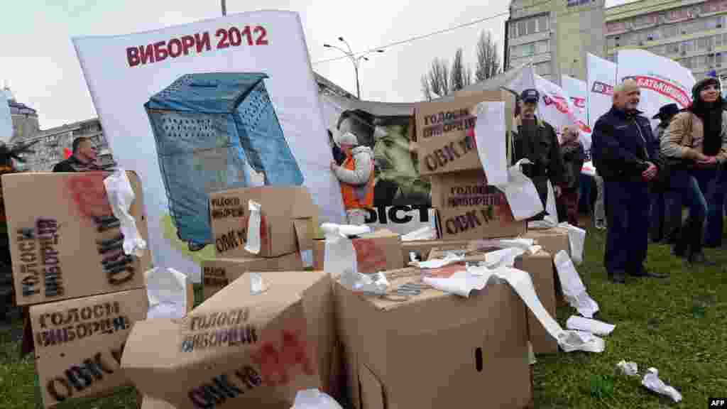 Protesters set up mock &quot;ballot boxes.&quot;