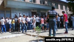 Uzbekistan - enrollees are in a queue for submitting documents near Samarkand State University