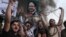 Supporters of Pakistan Muslim League-Nawaz (PML-N) chants slogans after the sentencing decision against former prime minister Nawaz Sharif, during a protest in Multan on July 7.