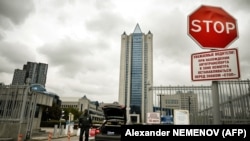 RUSSIA -- A traffic sign stands next to the Moscow office of Russian gas giant Gazprom in Moscow, September 10, 2021