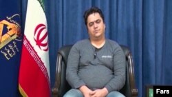 Screen shot from an Iranian state TV report showing Rouhollah Zam confessing and apologizing after he was captured by IRGC Intelligence. October 14, 2019