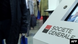 This photograph taken on November 23, 2017, shows the logo of French banking group Societe Generale at the Actionaria fair in Paris. / AFP PHOTO / ERIC PIERMONT