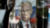  Портрет Путіна у вітрині книгарні в окупованому Сімферополі