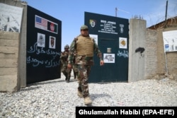 Afghan Army soldiers secure a military base that was previously in use by U.S. soldiers, in the Haska Meyna district of Nangarhar Province on April 14.