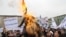 Afghan protesters burn an effigy of U.S. President Barack Obama. With just three years before the West hands off full control of the country's security, questions remain over Afghanistan's political maturity.