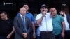 Armenia - Kapan mayor Ashot Haryapetian stands next to Prime Minister Nikol Pashinian at a public rally in the town's central square, Kapan, 07Jul2018