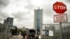 RUSSIA -- A traffic sign stands next to the Moscow office of Russian gas giant Gazprom in Moscow, September 10, 2021