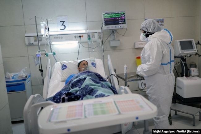 A patient being treated for coronavirus at a hospital in Tehran.