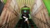 A Pakistani security official stands guard outside a mosque that was closed for weekly Friday prayers in the northwestern city of Peshawar on April 10.