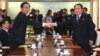 South Korea Unification Minister Cho Myung-gyon (left) shakes hands with North Korea's chief delegate, Ri Son Gwon during their meeting at the border truce village of Panmunjom in the Demilitarized Zone (DMZ) dividing the two Koreas on January 9.