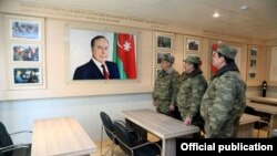 Azerbaijan - Defense Minister Zakir Hasanov (C) visits an Azerbaijani army base.