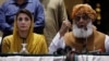 Pakistan Democratic Movement leader Maulana Fazlur Rehman along with Maryam Nawaz, the leader of Pakistan Muslim League Nawaz (PML-N) in a news conference in Karachi in Otocber 2020.