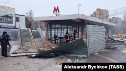 Police examine the site of an explosion in an underground passageway near Kolomenskaya Metro station near central Moscow on December 22. 