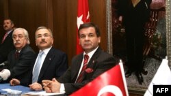 Turkish Energy Minister Hilmi Guler (center) at a January 2009 press conference discussing the Atomstroyexport consortium's bid and the Akkuyu project.