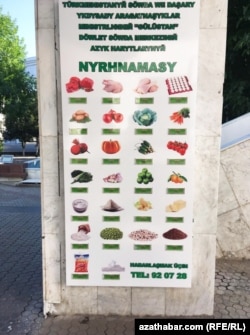A list of food prices outside a store in Ashgabat.