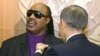 UN Secretary-General Ban Ki-moon appoints Stevie Wonder as a messenger of Peace at UN headquarters in New York.