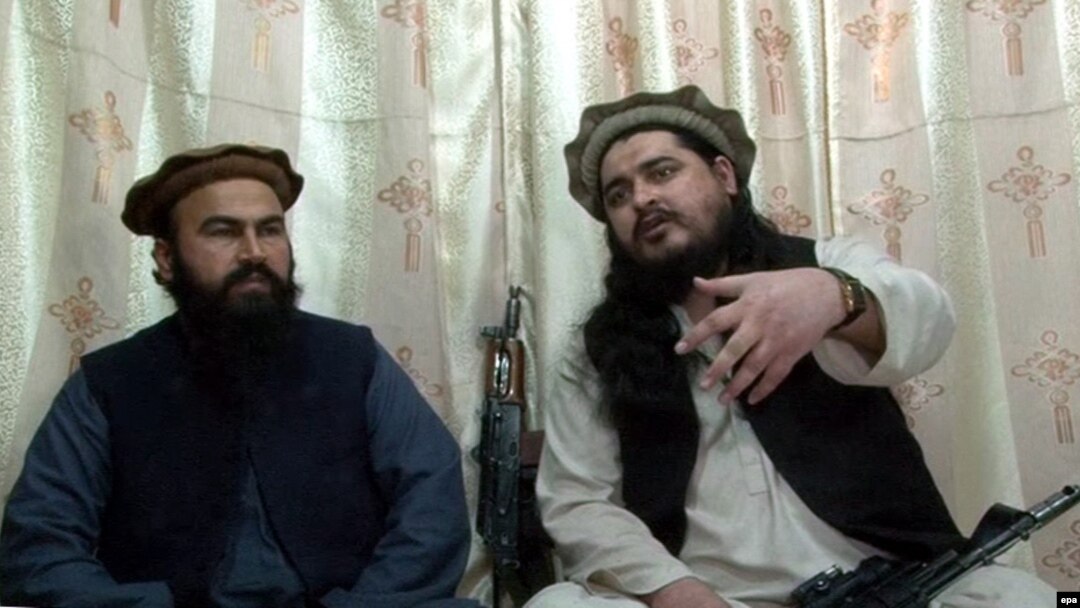 Hakimullah Mehsud (right), chief of Tehrik-e Taliban Pakistan (Pakistani Taliban movement), in an undated video recorded at an undisclosed location near the Pakistani-Afghan border.