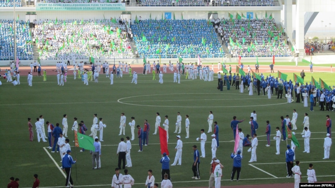 "When the president appears in the stadium, everyone will stand up and say the following, 'My beloved country Turkmenistan and glory to the Protector.' Let's practice it!" 